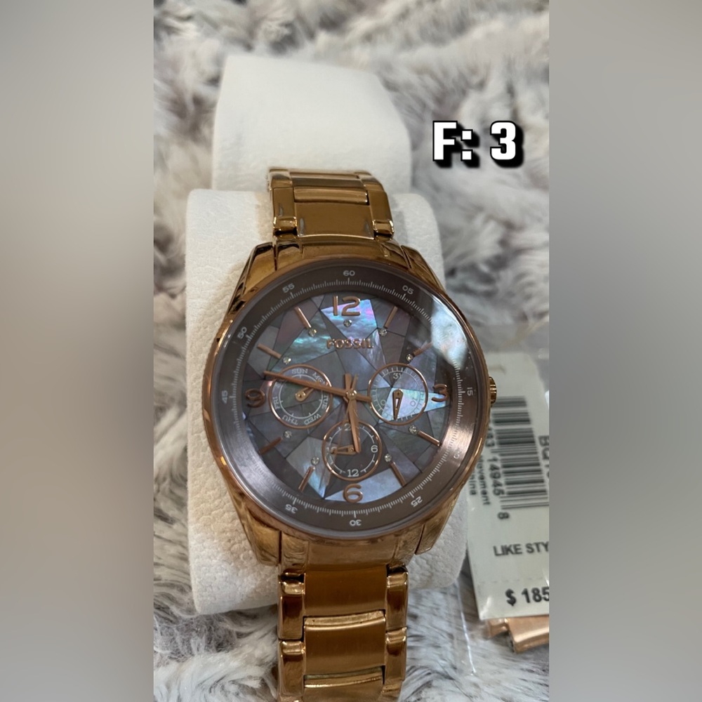 Dark Gold Fossil Watch with dark Abalone face.